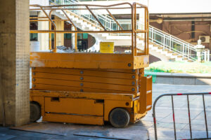 A yellow lift table in El Paso.